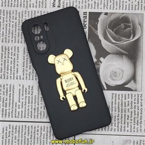 قاب گوشی Poco F3 - Mi 11i شیائومی طرح ربات KAWS سیلیکونی ژله ای پرو کمرا هولدر دار محافظ لنز دار مشکی طلایی کد 121