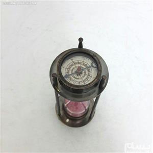 ساعت شنی برنزی دو طرف قطب نما دار