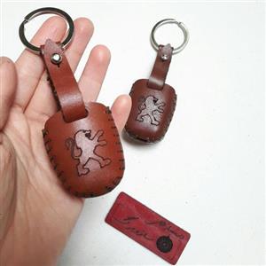 جاسوئیچی چرمی پژو 206 و 207 (کاور ریموت سوئیچ پژو) روکش چرم طبیعی کاور سوئیچ پژو 206 206SD و 207