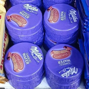 بیسکویت سکه ای با روکش شکلاتی میلکا - 30 گرم