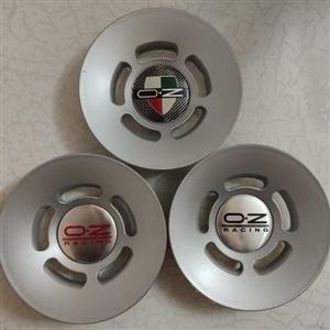 بچه قالپاق oz کاپ تورینگی چرخ ماشین اسپرت برند اوزد مارک لوگو او زد O.z racing درپوش خرچ خودرو