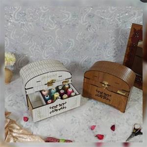 جعبه نخ و سوزن مدل صندوقچه کشودار.\nجنس چوب با لوازم کامل