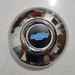 قالپاق نیسان مدل دایره شورلتی مناسب رینگ و لاستیک چرخ ماشین نیسان وانت آبی زامیاد باری جنس فلزی لوگو شولتی