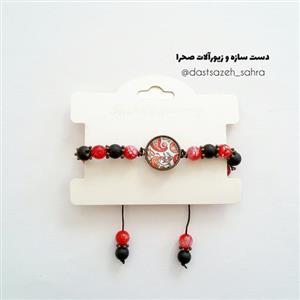 دستبند سنگ عقیق سرخ و انیکس مشکی با گره کشویی