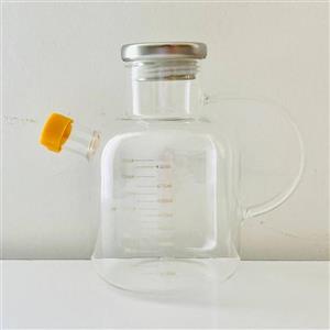 ظرف روغن ریز پیرکس درب استیل گنجایش 850 میلی لیتر