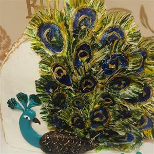 کیک خامه ای باتزئین طاووس وزن 1کیلو(هزینه ارسال بصورت پس کرایه ودرمقصد) 