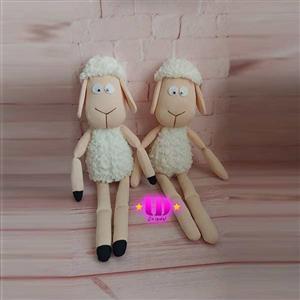 عروسک پارچه ای مژگان در قد 34سانت با تنوع لباس بالا