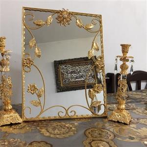 ایینه شمعدان خاص ابکاری طلای24عیار(وارداتی از دبی)\nقیمت ارزان به دلیل خریدقدیم