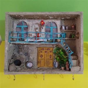 جاکلیدی دیواری.خانه دوطبقه روستایی محصولی از ستاره چوبی