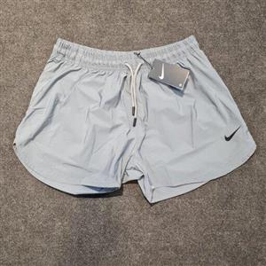 شلوارک ورزشی کوتاه NIKE طوسی (جنس تی سی)