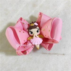 گلسر پاپیون صورتی با روبان طلاکوب ستاره ای و پیکسل فرشته