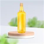 روغن ارده کنجد طبیعی 1 کیلوگرمی در بسته بندی بطری پلاستیکی شفاف