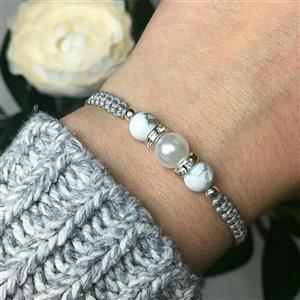 دستبند سنگی دخترانه و زنانه دارای بند نخی زیبا و شیک
