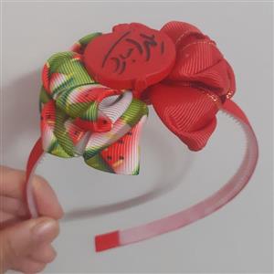 تل یلدایی با پاپیون روبان هندوانه ای و پیکسل اناری از جنس پلاستیک نشکن