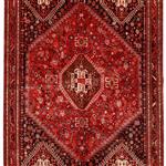 فرش دستباف شیراز طرح لچک و ترنج  رنگ زمینه لاکی رنگ حاشیه قهوه ای