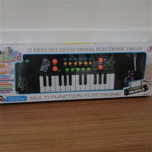 بازی آموزشی کیبورد پیانو (ارگ) دارای میکروفون و پایه نوت دارای 25 دکمه مناسب هدیه