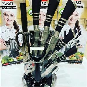 سرویس چاقو 533فوما ژاپن 9تیکه در دورنگ مشکی و نقره ای و تیزی چاقو درجه یک