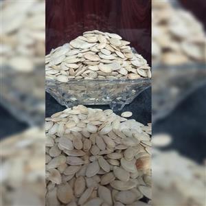 تخمه کدو گوشتی بوداده خوش طعم و تازه محصول امسال (بسته 1000گرمی)