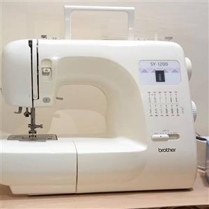 چرخ خیاطی  گلدوزی سینگر با نمایشگر مدل ژتون (مدل 9600 Lady coast)