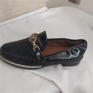 کفش پسرانه کد99از سایز 31تا36رنگ سرمه آیی ومشکی