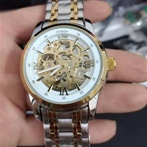 ساعت اتومات مردانه فیترون اتوماتیک نبضی ضدآب رنگ ثابت ساعت مچی مردانه عقربه ای بدون باتری ساعت طلایی قفل ضامن دار