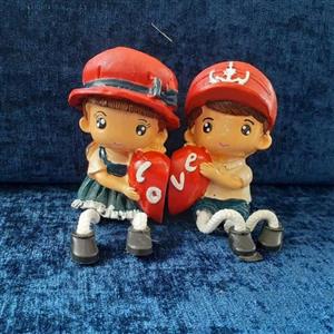 مجسمه کادویی تزئینی منزل مجسمه عروسک لاو اکسسوری ویترینی