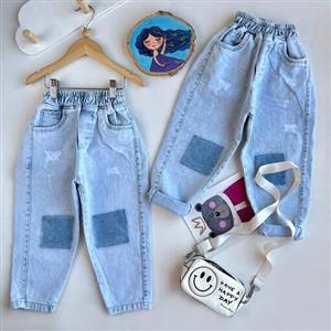 شلوار جین مام استایل آبی یخی کمرکش مناسب برای دخترو پسر  کیفیت عالی و تضمینی