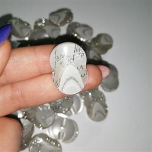 دکمه لباس طرح شیشه ای طوسی رگه اکلیلی بسته 10 عددی