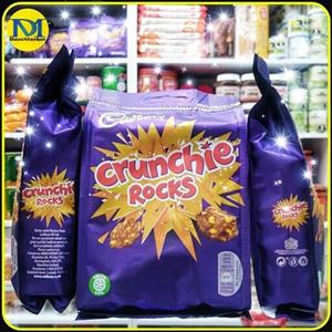 شکلات کدبری کرانچی راکز با تکه های کرن فلکس و عسل و شیر 109 گرم انگلیسی cadbury crunchie rocks Chocolate