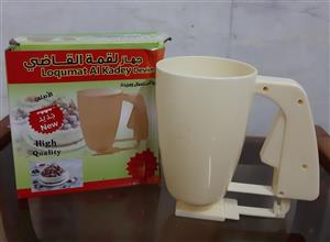 دستگاه مخصوص پخت شیرینی لگیمات  ( شیرینی مخصوص عربی)