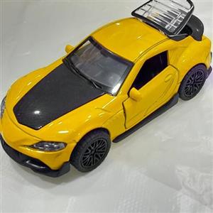 ماکت ماشین فلزی تویوتا سوپرا Toyota supra زردرنگ موزیکال و چراغدار