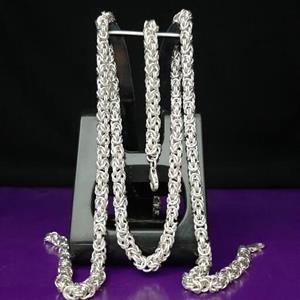 ست زنجیر و دستبند نقره مردانه کاملا دست ساز طرح و مدل کرال وزن کل 98 گرم طول زنجیر  66 سانت طول دستبند 22 سانت 