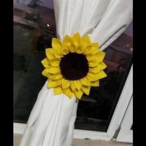 پرده جمع کن ( آویز پرده) برای بستن و جمع کردن پرده که شکل زیبایی به خانه و پرده میدهد
