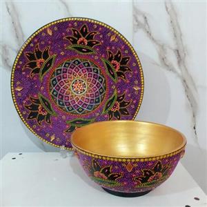 کاسه و بشقاب سفالی نقطه کوبی طرح سرخ ابی و گل داخل طلایی