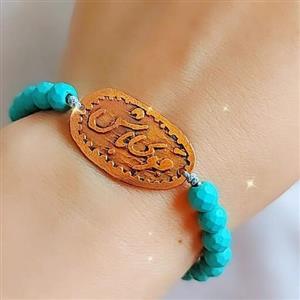 دستبند زنانه دستساز مسی با نوشته قوی باش و بند سنگ فیروزه