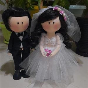 عروسک روسی عروس و داماد، ارتفاع هر عروسک 30 سانتیمتر هست .
