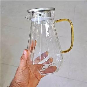 پارچ و لیوان پیرکس مدل ساده دسته طلایی برند Deli بسته 8 عددی