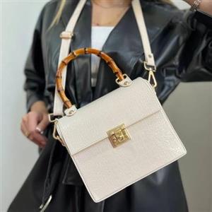 کیف ورنی پوست ماری کرم