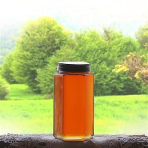 عسل معطر بهارنارج استان فارس صادراتی 700 گرمی ظرف شیشه خرس-خور  ضمانت مرجوعی