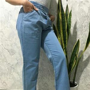 شلوار چهار جیب جنس جین کاغذی رنگ آبی روشن دارای سایزبندی ( ارسال رایگان )