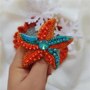 گل سینه جواهر دوزی طرح ستاره