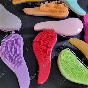 برس گره باز کن مو با دندانه های کوتاه و بلندِ منعطف در رنگ بندی جذاب  مناسب انواع مو