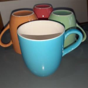ماگ دسته دار جنس سرامیکی طرح دورنگ دررنگهای صورتی و آبی و نارنجی وسبز