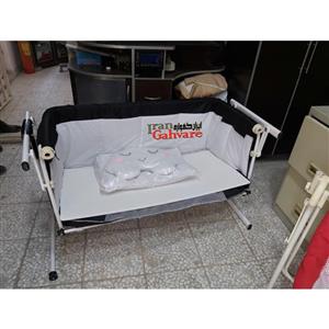 تخت و گهواره برقی کنار مادر میترا