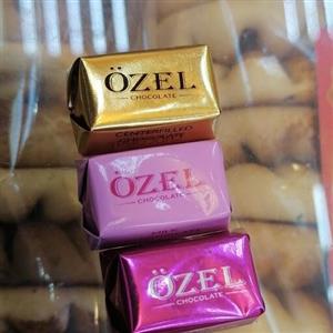 شکلات ozel  اوزل درطعم ها ورنگ های متفاوت
