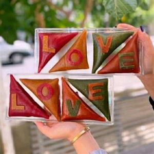 باکس لواشک سمبوسه ای طعم انار زردآلو کیوی آلو