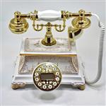 تلفن رومیزی میرون کد112 با کیفیت بسیار بالا  رنگ سفید صدفی و  طلایی  دارای کالر ایدی و اسپیکر خروجی صدا