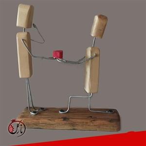 آدمک دکوری چوبی ساخته شده از  چوب و فلز قابل استفاده در دکور منزل سایز و رنگ  به سفارش شما قابل تغییر می باشد