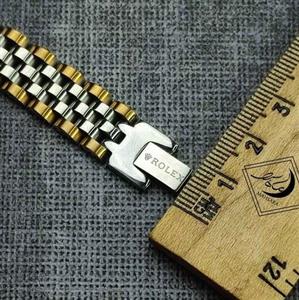 دستبند استیل رولکس دور طلایی نقره ایی 12 میل rulex اصل