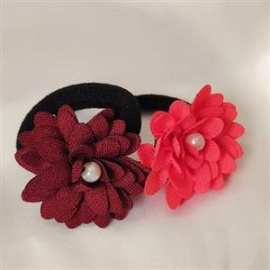 کش مو طرح گل کوچک ، تنوع رنگ ، جنس پارچه ای ، کیفیت عالی ،  به صورت عمده با بسته های 12 تایی